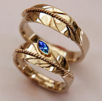 Upright Lives two-tone eagle feather wedding rings designed and handcrafted by Zhaawano