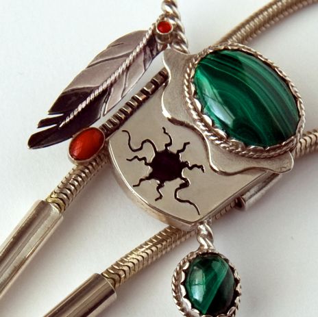 Midewewe'igan (Midewiwin Drum) bolo tie close up of silver and stone slide
