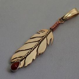Gold and red coral eagle feather pendant Touches the Sun
