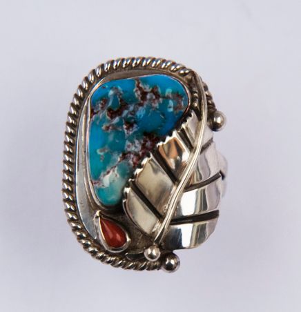 Thunder Leaf silver and turquoise ring with a Native American theme