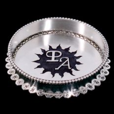 Ojibwe-style hammered silver bottle stand