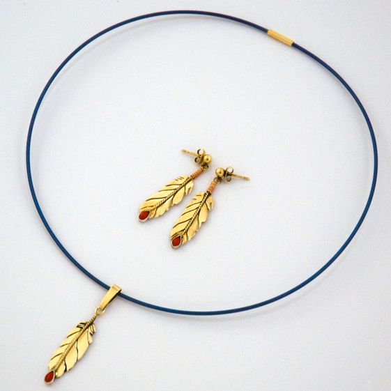 Giizisonaamid Ishpiming Anishinaabe gold eagle feather jewelry set