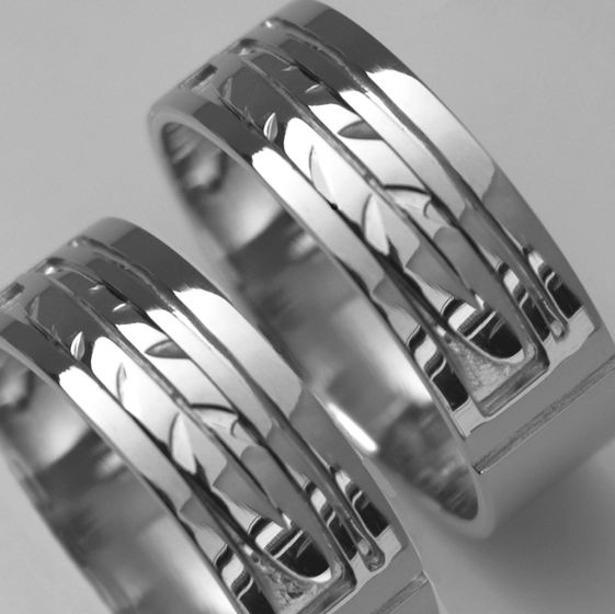 Native American silver eagle feather wedding rings titled Circle of Flight
