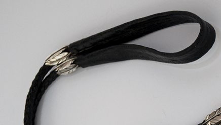 Detail silver eagle feather cord adornments