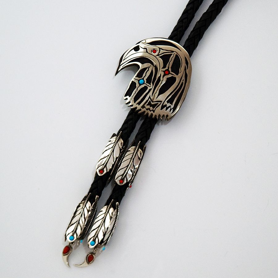 The Sacred Love Story of Winter Hawk and Thunder Eagle Woman bolo tie by Zhaawano Giizhik