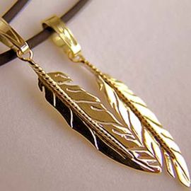 Gold eagle feather pendants Migizi Miigwan