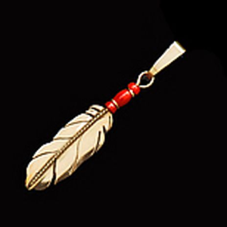Native american-inspired gold eagle feather jewelry handcrafted by Zhaawano