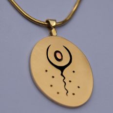 Graphic outline drawing overlay style gold and silver pendant The Spirit Sings