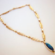 Grandmother's Journey Ojibwe gold turquoise sapphire eagle feather necklace