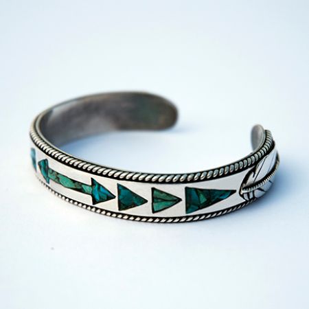 Wiinabozho's Bow sterking silver cuff bracelet inlaid with turquoise