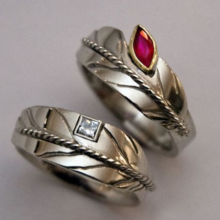 Giizhig-enaabandangig eagle feather rings by Zhaawano Giizhik