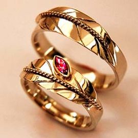 Ojibwe eagle feather wedding rings Flower of Fire