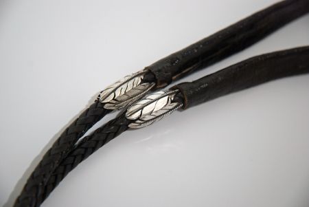Leather bolo tie lanyard detail