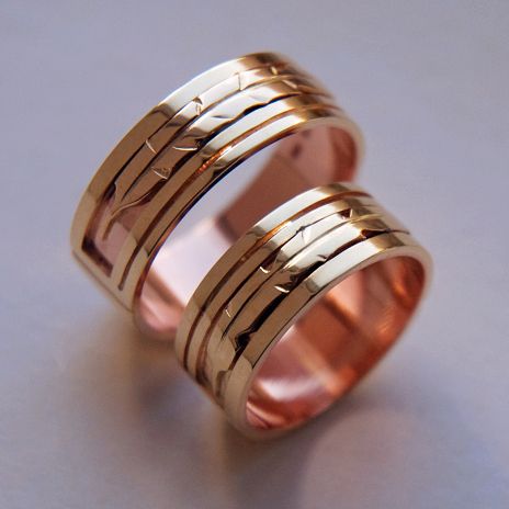 Touched by the Sun gold Anishinaabe-inspired eagle feather wedding rings 