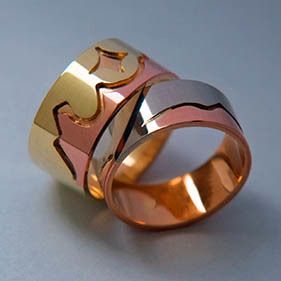 Ojibwe Sleeping Bear Dunes wedding rings by Zhaawano Giizhik