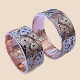 Ojibwe Midewiwin graphic overlay wedding rings Brother Wolf