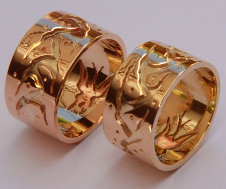 Anishinaabe gold wedding rings depicting a Midewiwin Life Road and butterflies
