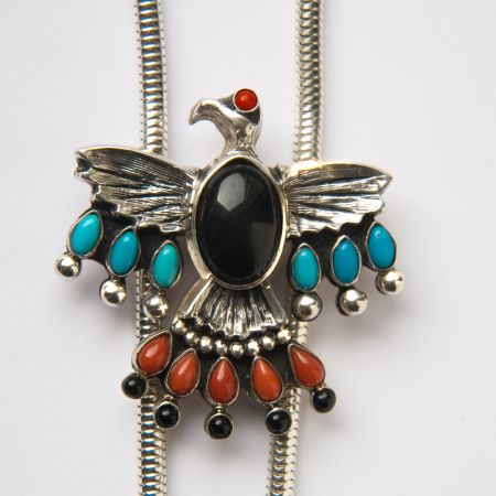 Animikii-binesi silver and stone bolo tie close-up