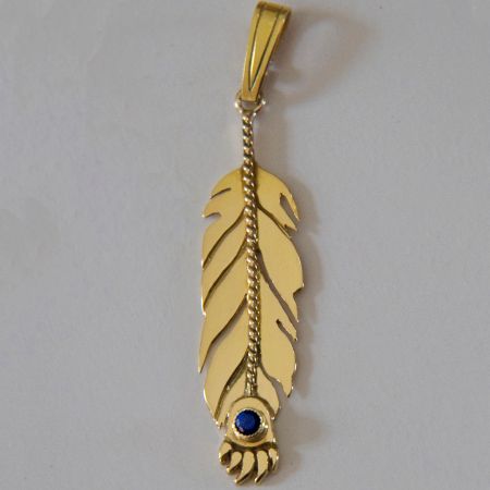 Native American Ojibwe eagle and bear paw feather pendant of 14K gold set with sapphire