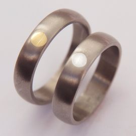 Each side Of The Winter Sky titanium Native American wedding rings with gold inlay