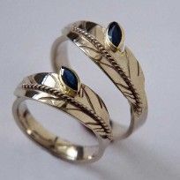 Sound Of Flight white gold eagle feather wedding rings set with marquise-cut sapphires 