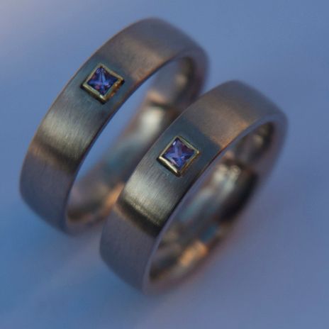 Palladium white gold wedding rings set with amethyst The Color of Love