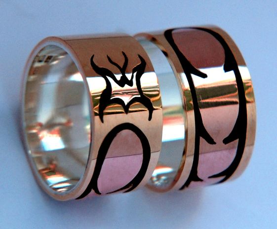 Native-American wedding bands of gold and silver with Ojibwe grapic overlay designs